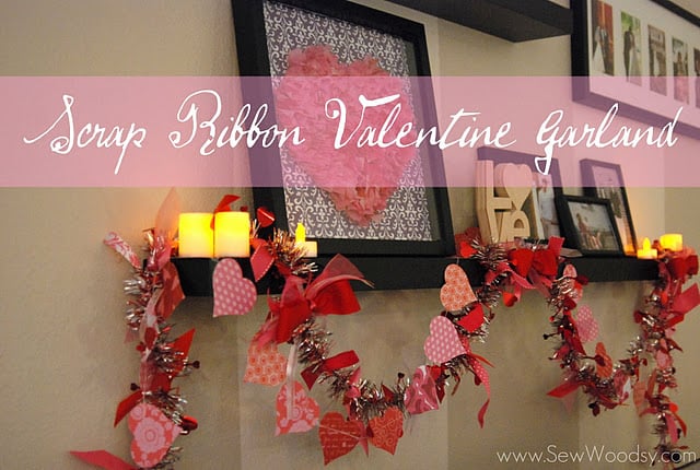 Valentine's garland with other valentine decor on a shelf.