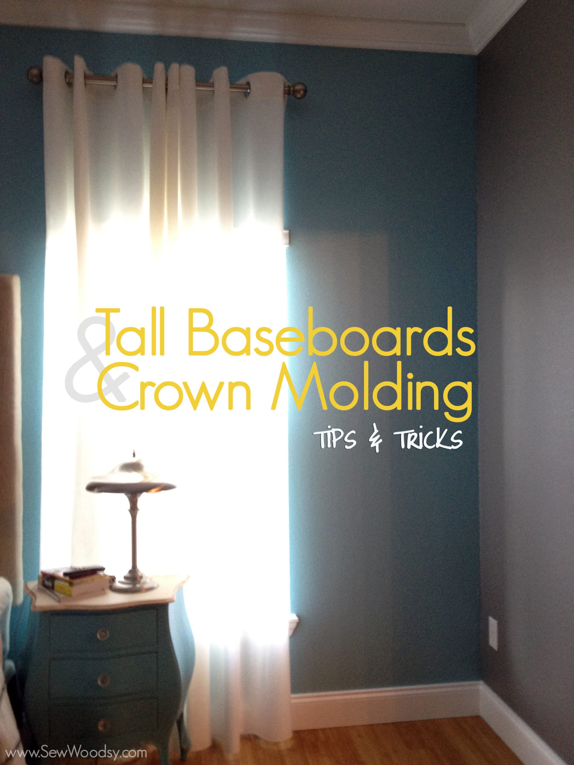 tall baseboards & crown molding