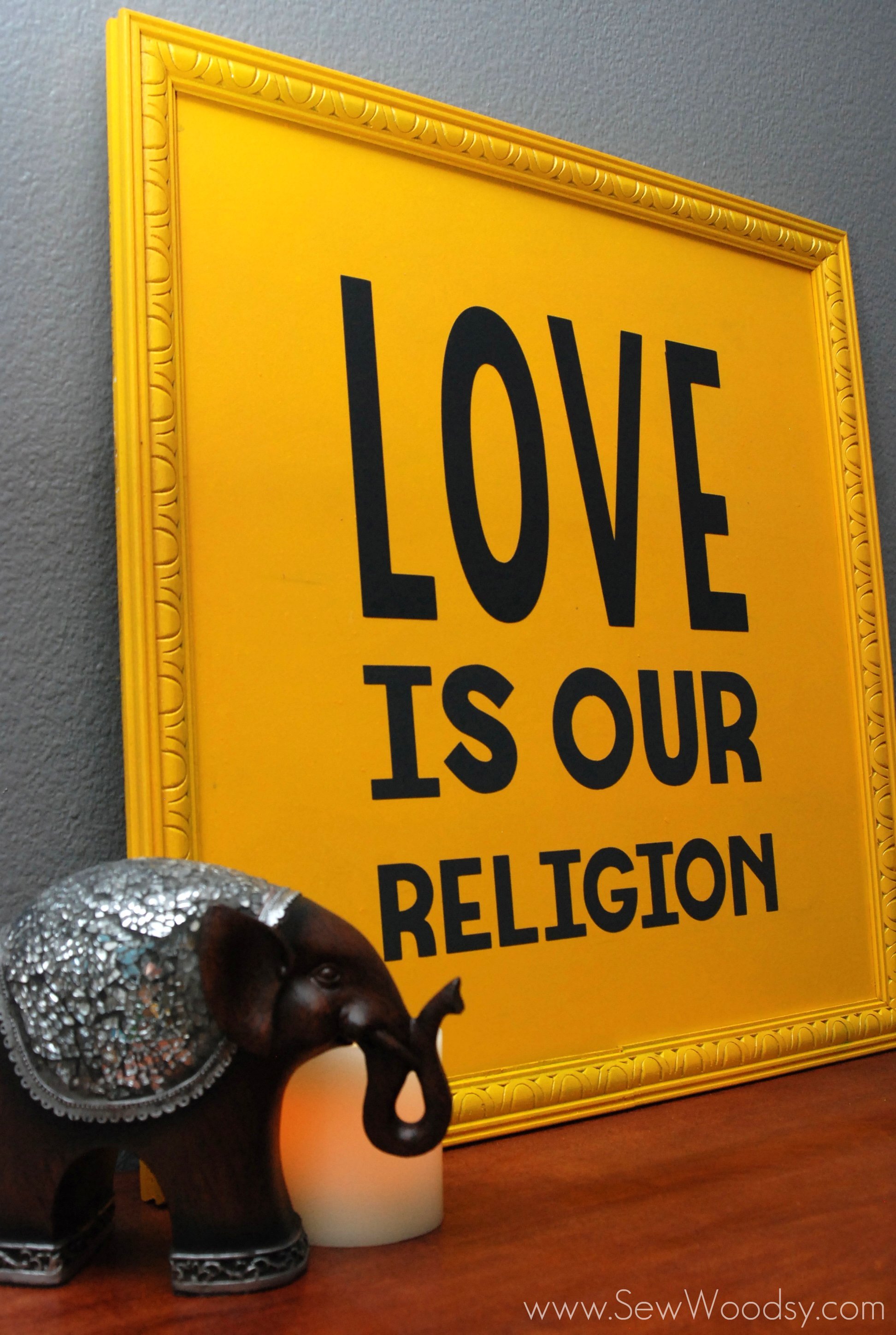 love is our religion sign