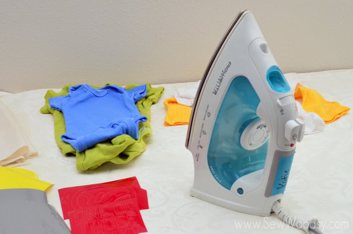 Baby Shower Onesie Station using Cricut Iron-On Vinyl #babyshower #DIY #Craft #Cricut