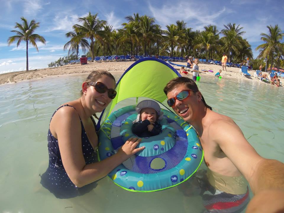 Cruising with an Infant family photo on coco cay