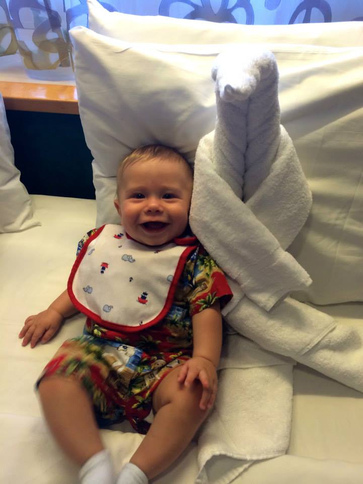 cruising infant with towel animal