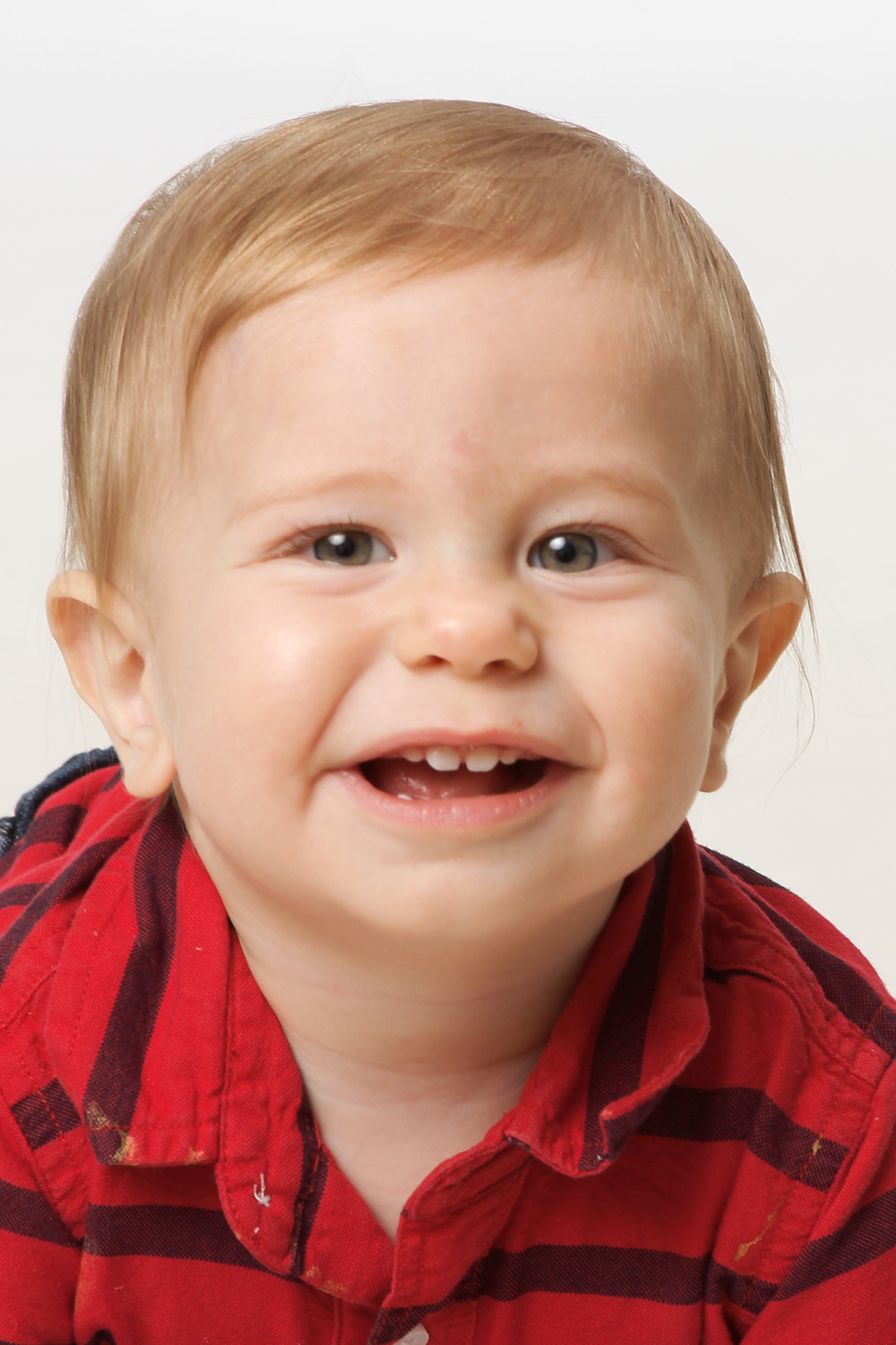 10 month old baby boy  with blonde hair.