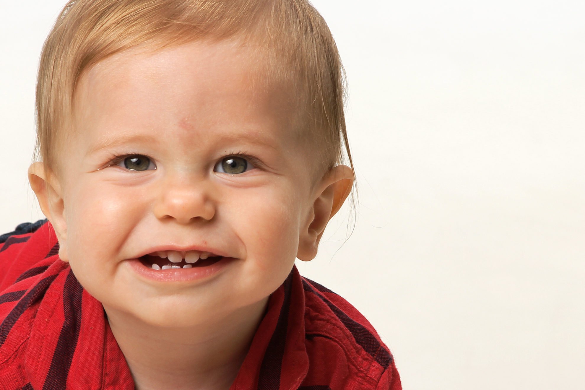 blonde hair male baby with a squishy face