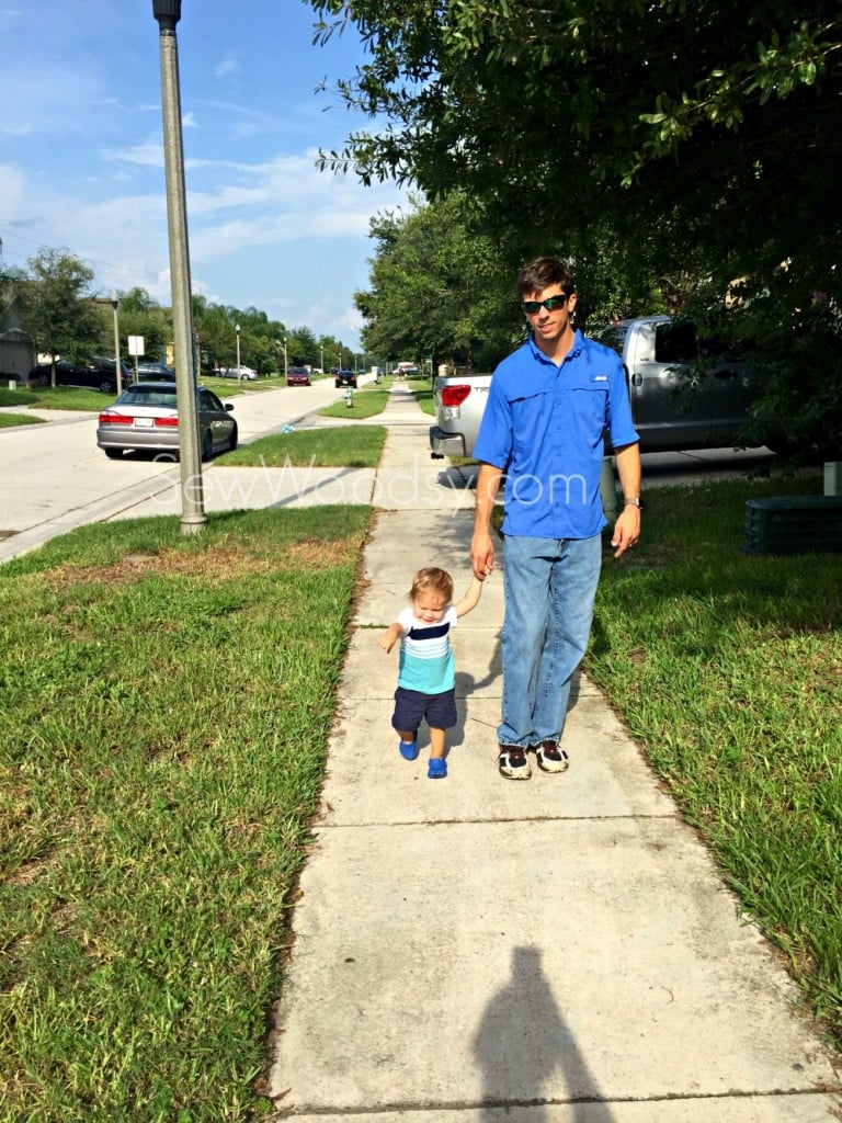 dad and son holding hands