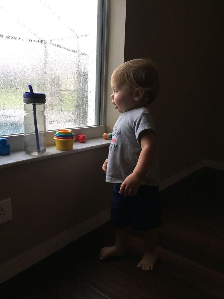 ryder playing in his make-shift play room on a rainy day