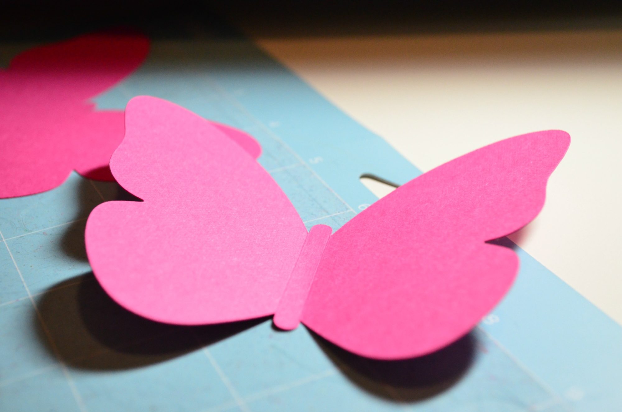 Create a Paper Butterfly Wall using the Cricut Maker - Sew Woodsy