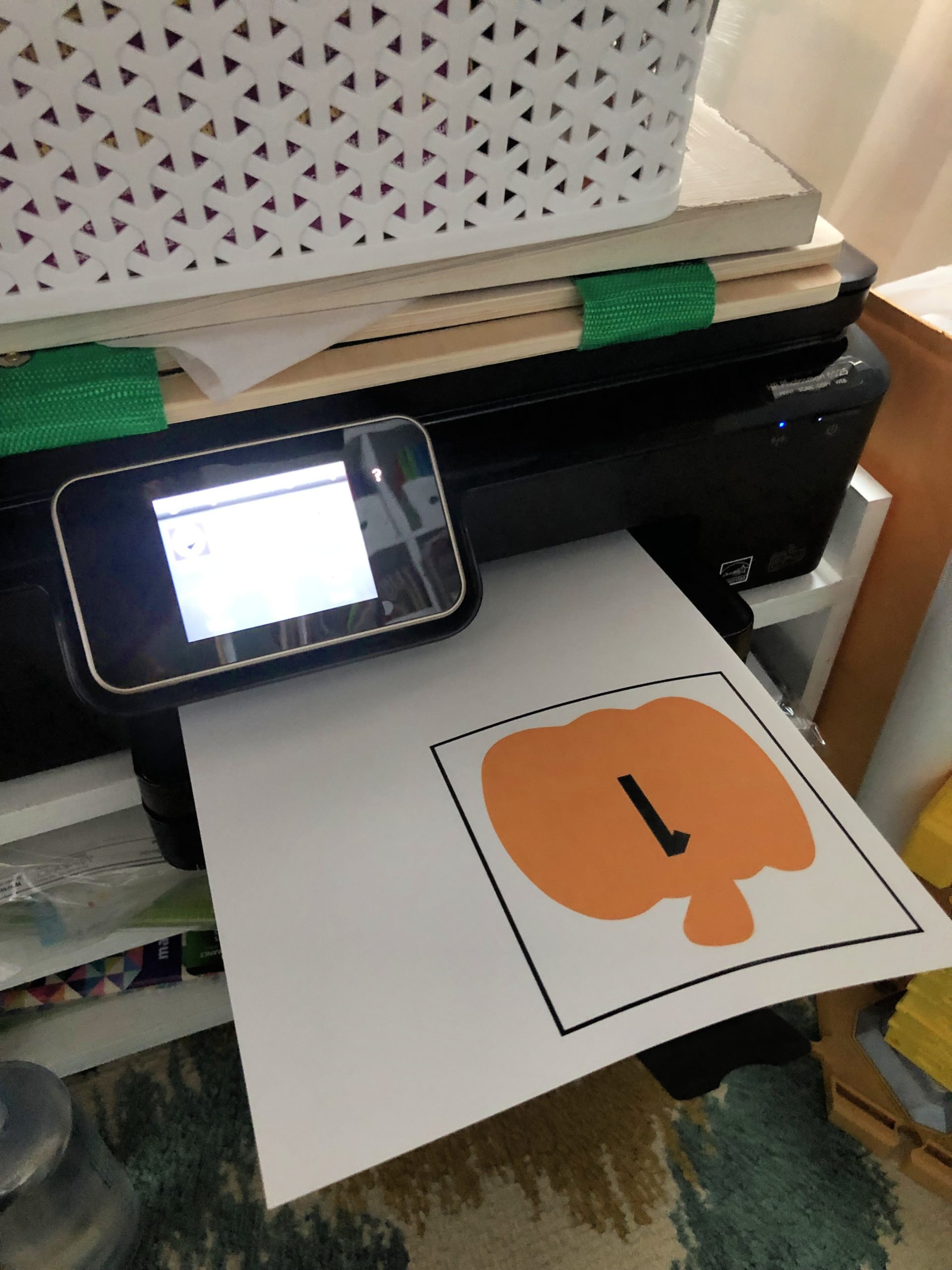DIY Fishing for Numbered Pumpkins Game being printed on a printer