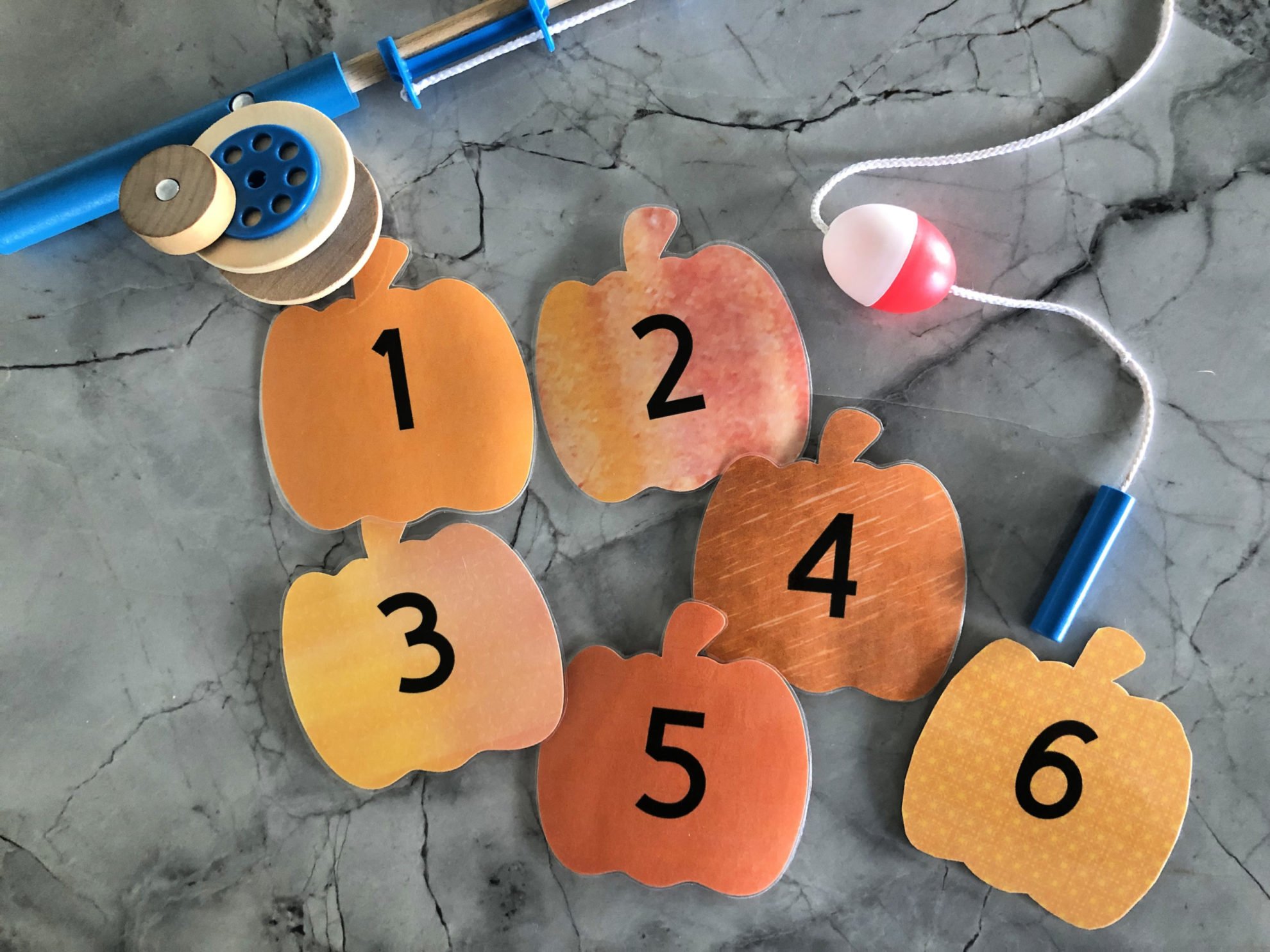 DIY Fishing for Numbered Pumpkins Game perfect for class parties. 