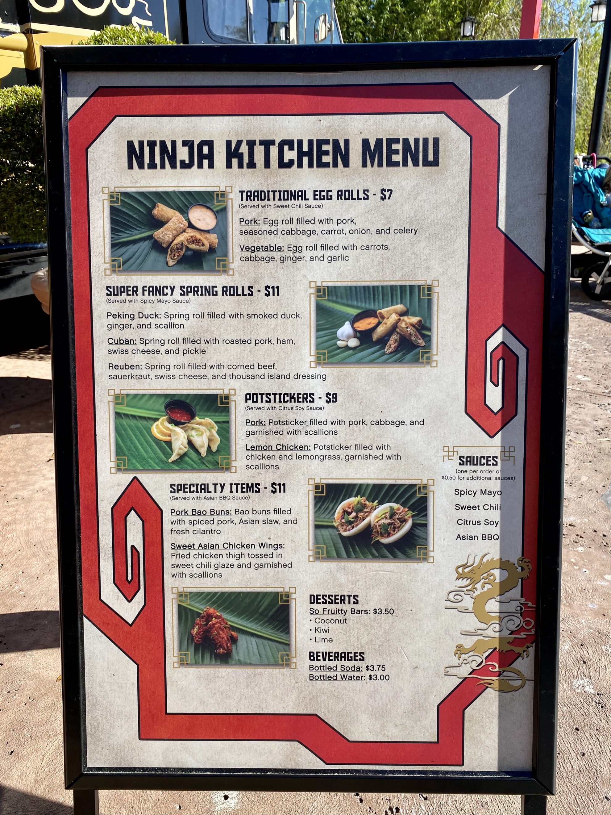 Sandwich board with ninja kitchen menu.