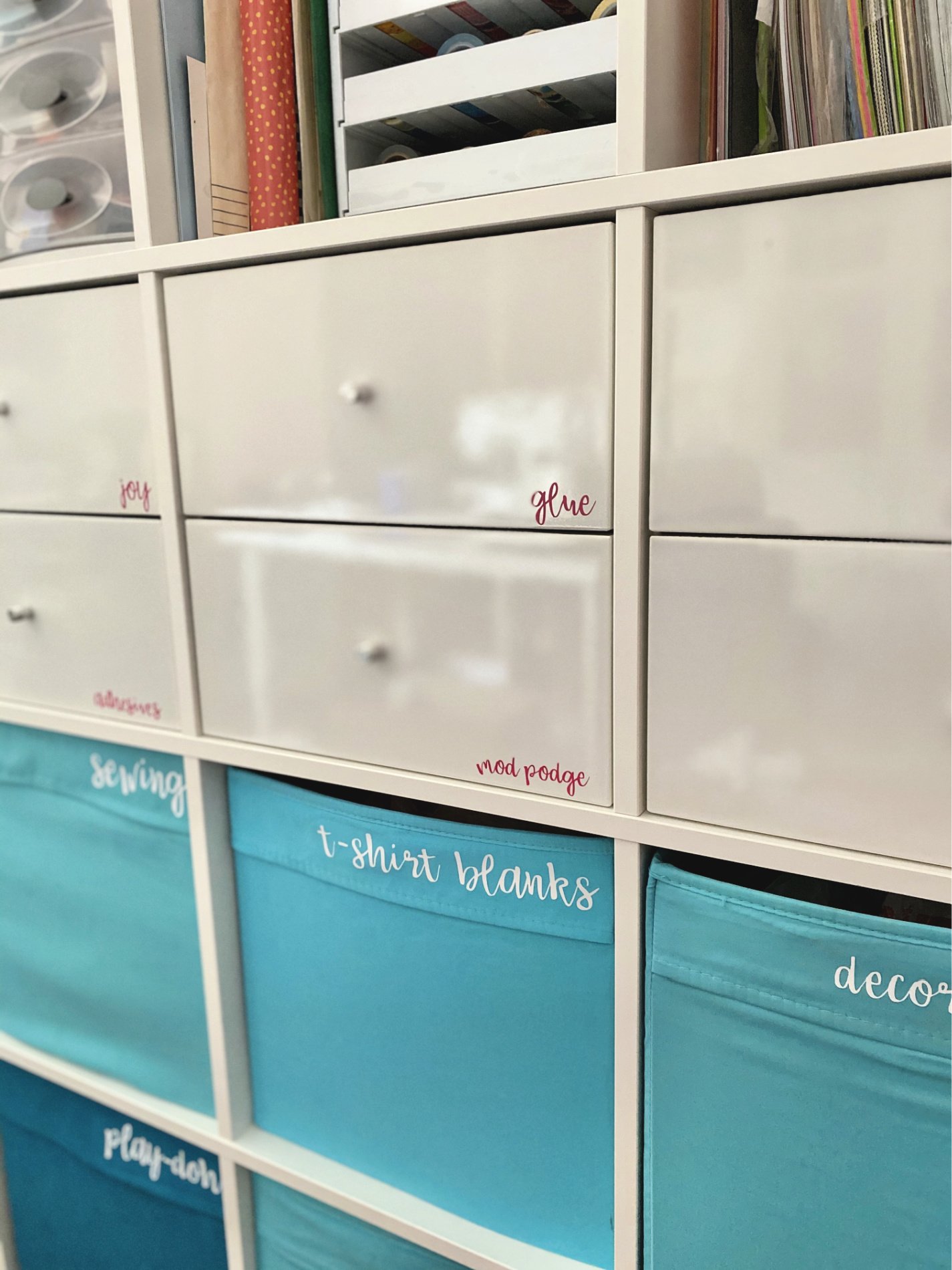 White draws with tiny pink vinyl applied to drawers.