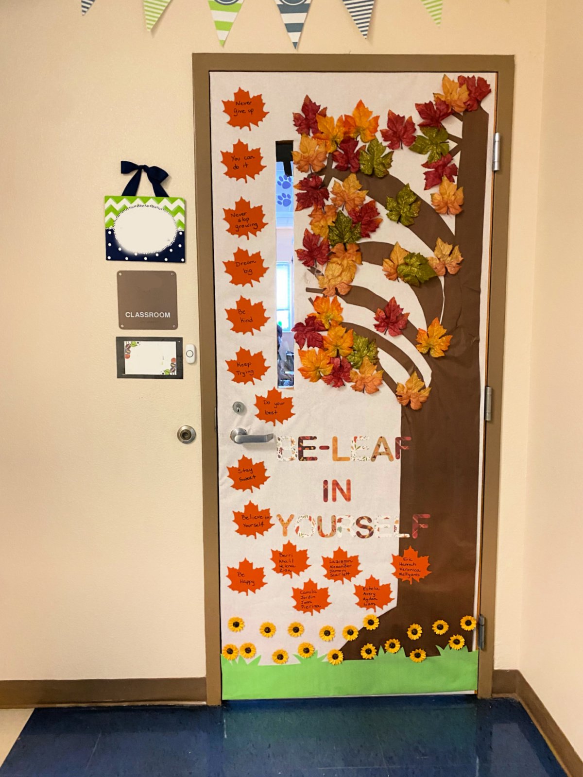 Brown tree with fall leaves and positive affirmations on leaves.